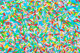 modern trendy pattern of sprinkles for design banner, poster, flyer, card, postcard, cover, brochure over blue background, top view