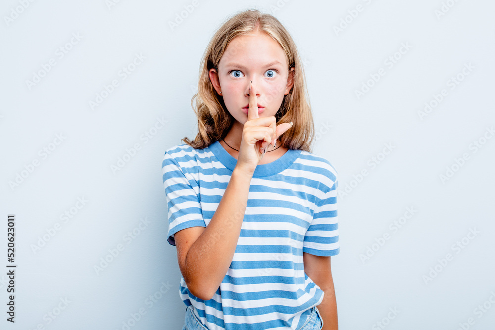 Caucasian teen girl isolated on blue background keeping a secret or asking for silence. Caucasian teen girl isolated on blue background keeping a secret or asking for silence.