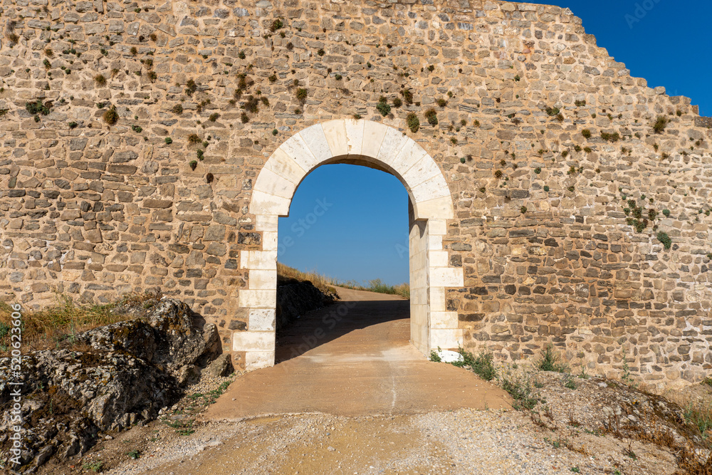 Stone arch at the entrance to Moya castle, in Castilla la Mancha (Spain)