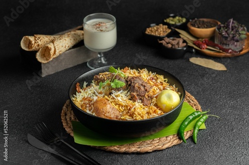 Tasty mutton biryani served on the table