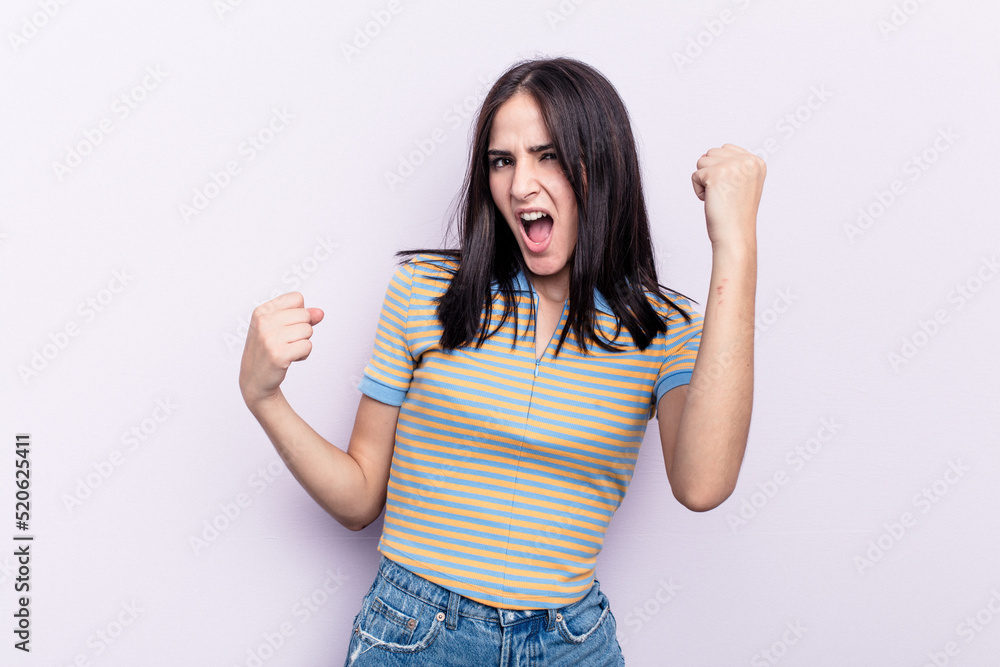 Young caucasian woman isolated on pink background cheering carefree and excited. Victory concept. Young caucasian woman isolated on pink background cheering carefree and excited. Victory concept.
