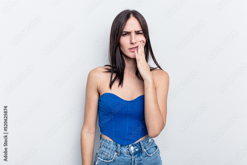 Young caucasian woman isolated on white background having a strong teeth pain, molar ache. Young caucasian woman isolated on white background having a strong teeth pain, molar ache.