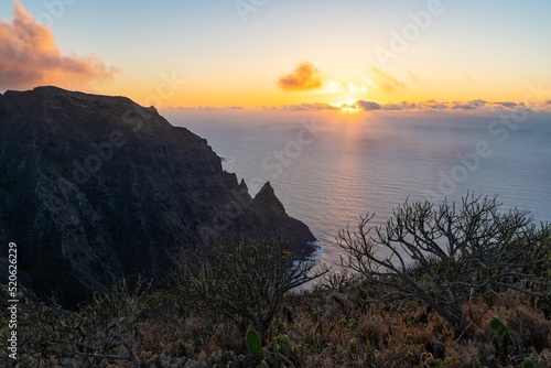 Aerial view of a sunset sky over the Roque de Taborno in Anaga Rural Park, Tenerife, Canary islands photo