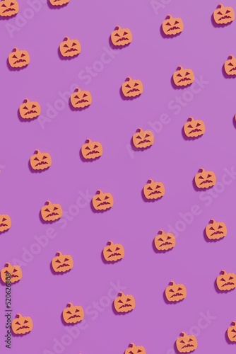 Flat lay orange pumpkin head symbols on a violet background. Modern creative 3d render Halloween illustration. Trendy Halloween 3d background concept