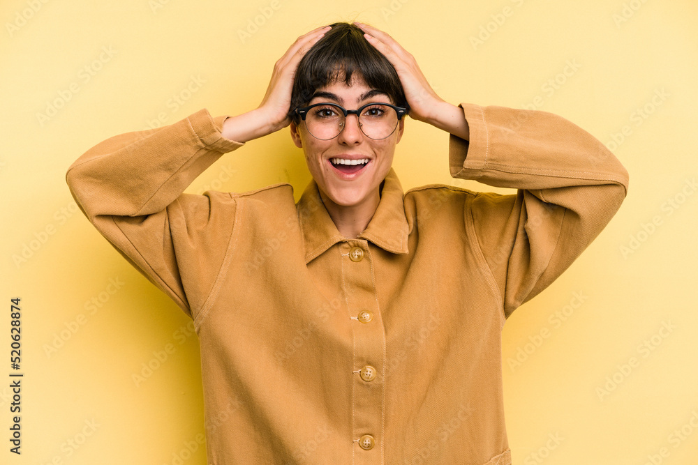 Young caucasian woman with a short hair cut isolated screaming, very excited, passionate, satisfied with something. Young caucasian woman with a short hair cut isolated screaming, very excited, passionate, satisfied with something.