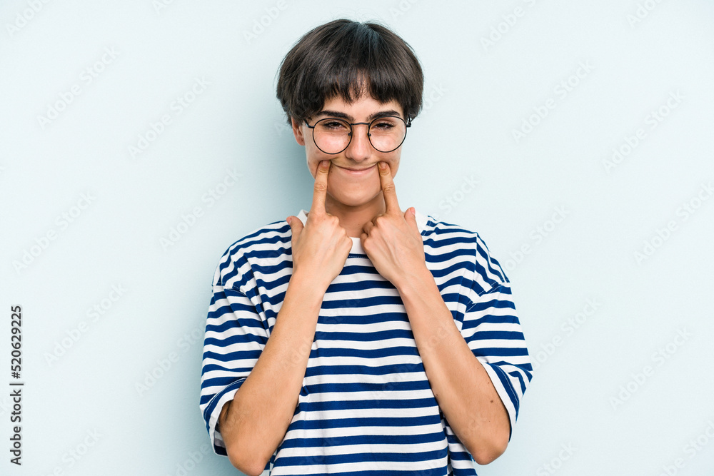 Young caucasian woman with a short hair cut isolated doubting between two options. Young caucasian woman with a short hair cut isolated doubting between two options.