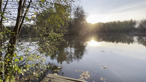 Lake in sunset in the autumn photo