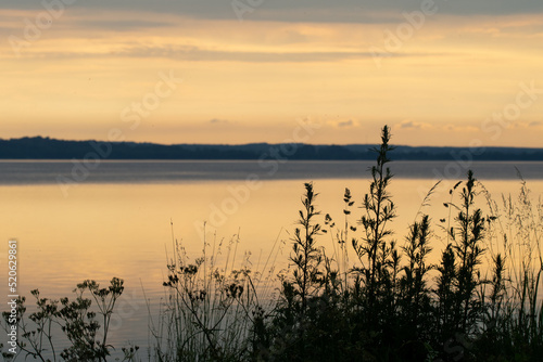 Landscape photo of lake during sunset