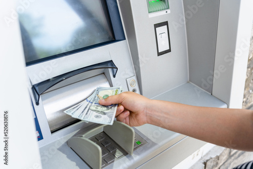 Atm machine money cash. Woman withdraw money bill. Holding american hundred dollar cash. Bank credit card and dollar bill.