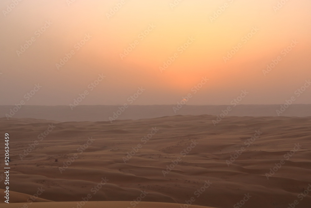 sunset in the desert Wahiba Sands in Oman sunset in the desert Wahiba Sands in Oman