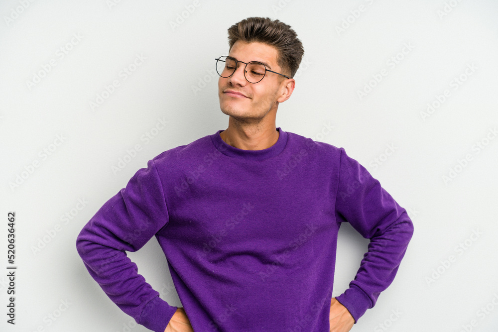 Young caucasian man isolated on white background dreaming of achieving goals and purposes Young caucasian man isolated on white background dreaming of achieving goals and purposes