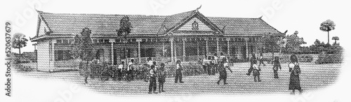 School Building with students, Portrait from Cambodia 100 Riels 2001 Banknotes. photo