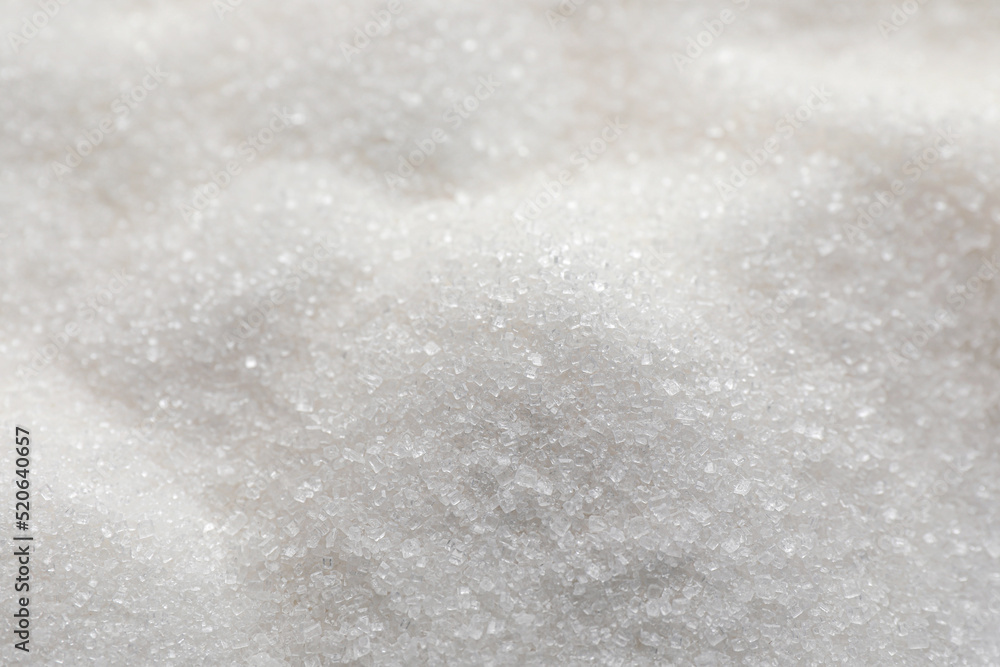 Sweet granulated sugar as background, closeup view Sweet granulated sugar as background, closeup view