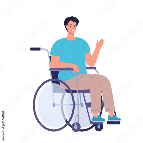 Niceyoung man with disabilities sitting on the wheelchair and kindly waves his hand in greeting