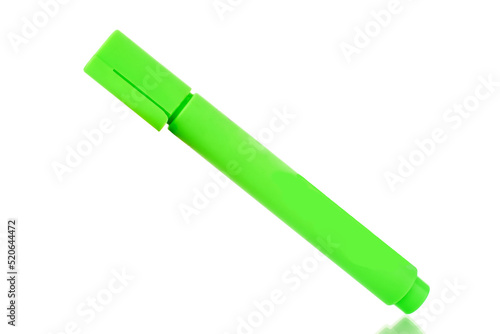 One green felt-tip pen, close-up, isolated on a white background.