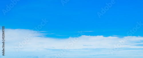 Blue sky and clouds. Wide photo.