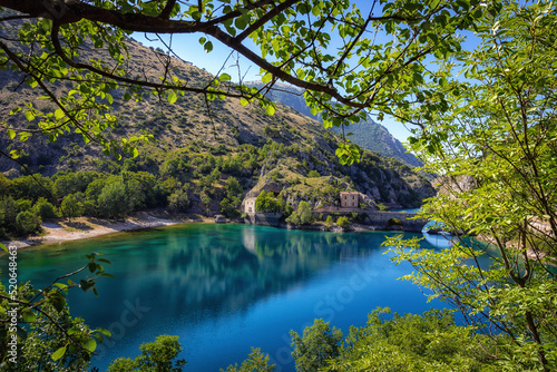 San Domenico lake, Abruzzo - Italy. Small lake surrounded by mountains and rocky spurs, in the green heart of an almost uncontaminated nature. 