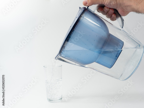 Jug with water filter made of transparent plastic.