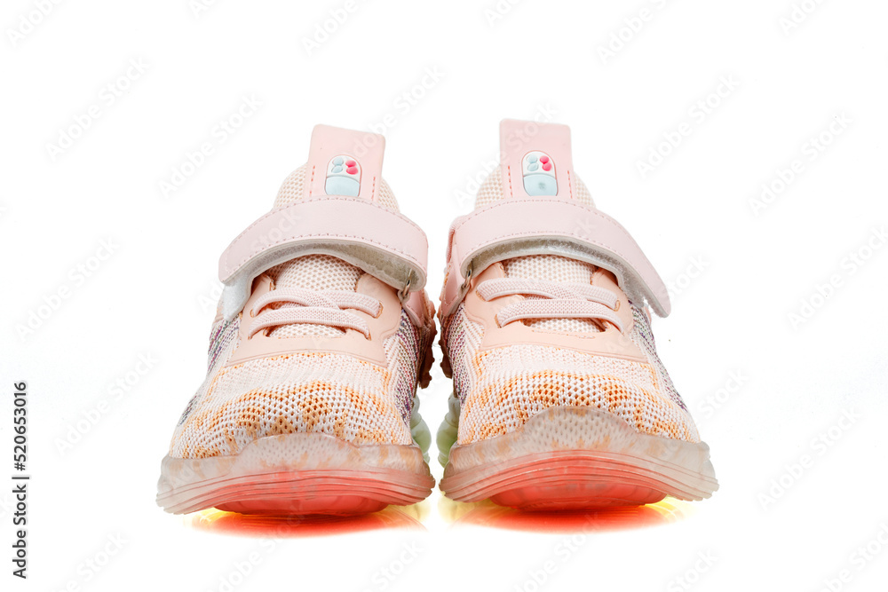 New unbranded running shoes, running shoes or training shoes isolated on white background. Full depth of field. Close-up.