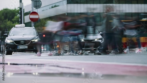 Wallpaper Mural Time-lapse unrecognizable people crowd crossing city street, busy crossroad, pedestrians crossing crosswalk intersection, car traffic. Timelapse rush hour crowded people walk, daylight, fast motion Torontodigital.ca