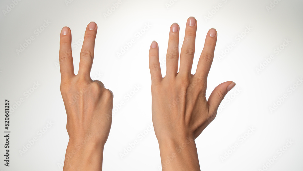 Women's hands count on fingers seven back of palms Women's hands count on fingers seven back of palms