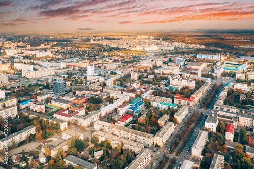 Aerial view of Homiel cityscape skyline in autumn day. Dramatic sky over residential district. Bird's-eye view of Gomel, Belarus.