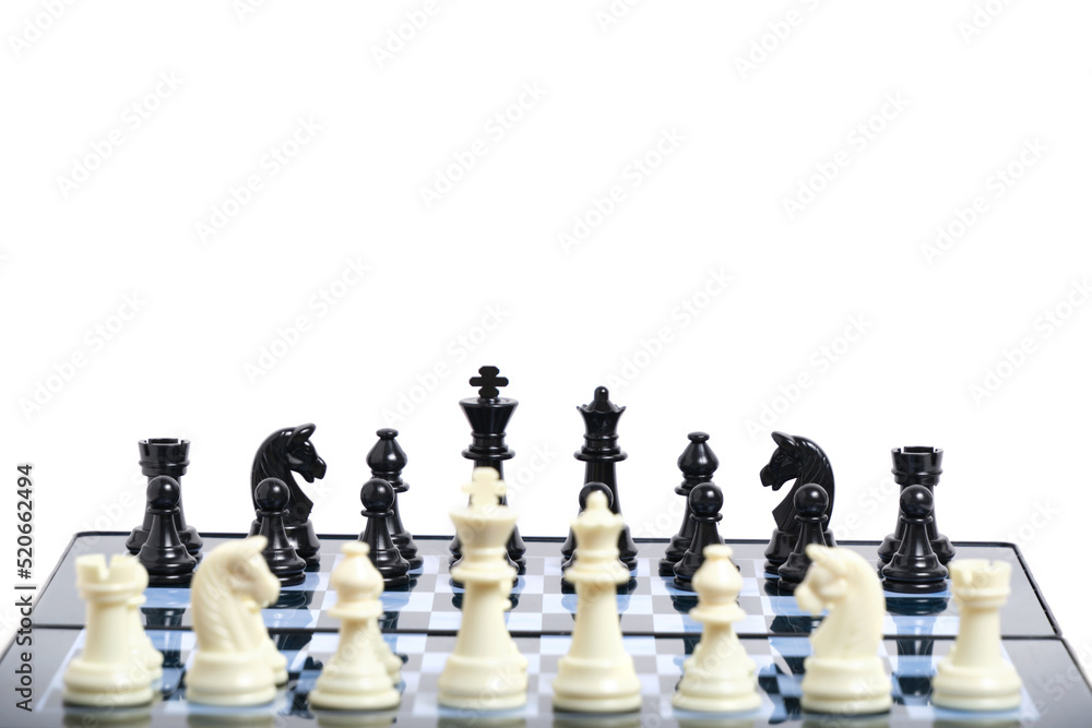 Black and white chess pieces on a chessboard on a light background. Black and white chess pieces on a chessboard on a light background.