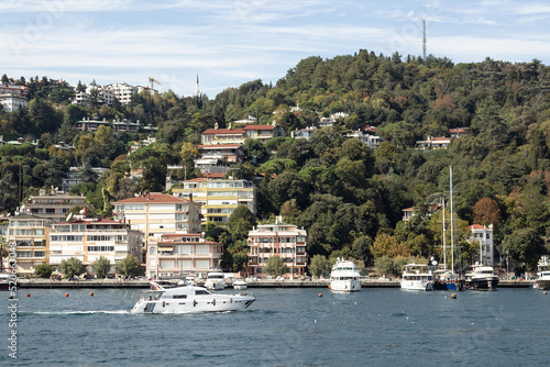 Canvas Print View of a yacht passing on Bosphorus and Bebek neighborhood on European side of Istanbul