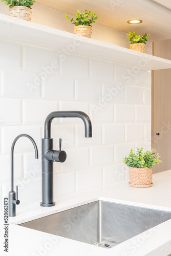 Vertical photo of a renovated kitchen sink