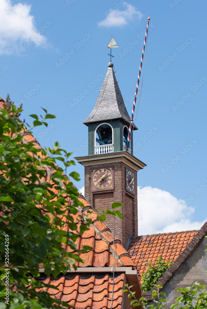 Enkhuizen, Netherlands. June 2022. The church and drawbridge of the Zuiderzee Museum in Enkhuizen.