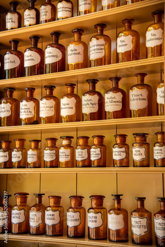 Enkhuizen, Netherlands, June 2022. Shelves with glass jars containing ingredients for medicine.
