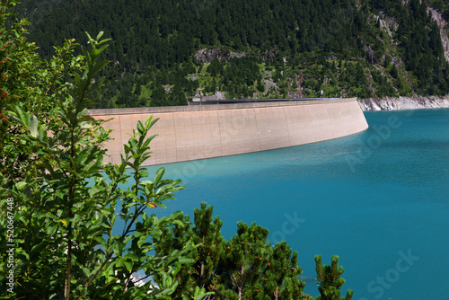Vivid blue mountain lake in summer Alps. Speicher Zillergrundl dam  Zillertal Alps  Austria