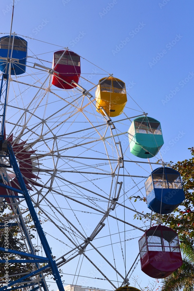 Colorful ferris wheel in an amusement park