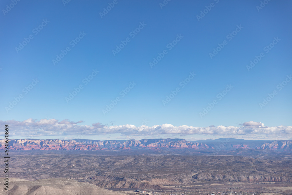 View of red rock mountains in Sedona Arizona taken from mountaintop in Jerome Arizona View of red rock mountains in Sedona Arizona taken from mountaintop in Jerome Arizona