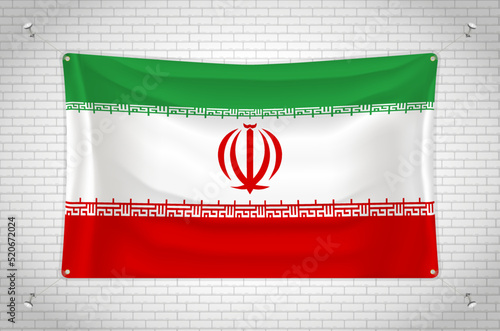 Iran flag hanging on brick wall. 3D drawing. Flag attached to the wall. Neatly drawing in groups on separate layers for easy editing.