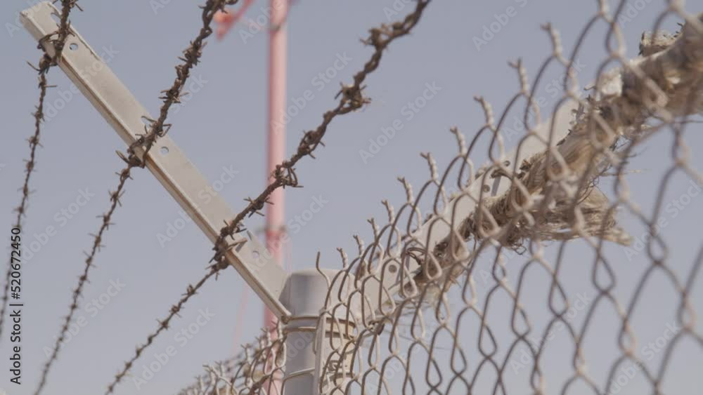 Close-up shot of a barbed wire fence Close-up shot of a barbed wire fence
