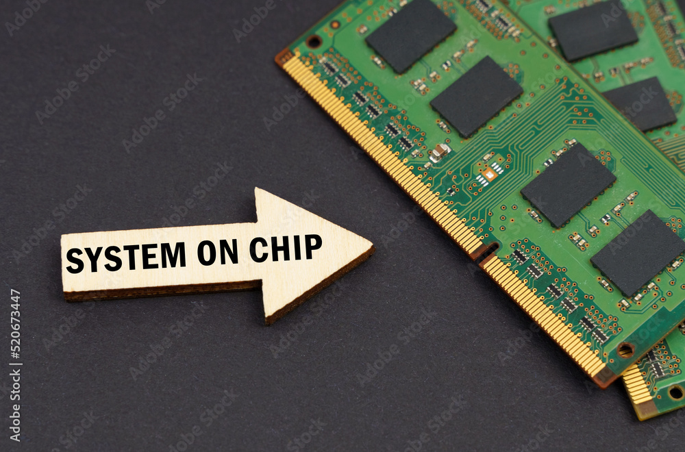 On the black surface lies RAM and an arrow with the inscription - System On Chip On the black surface lies RAM and an arrow with the inscription - System On Chip