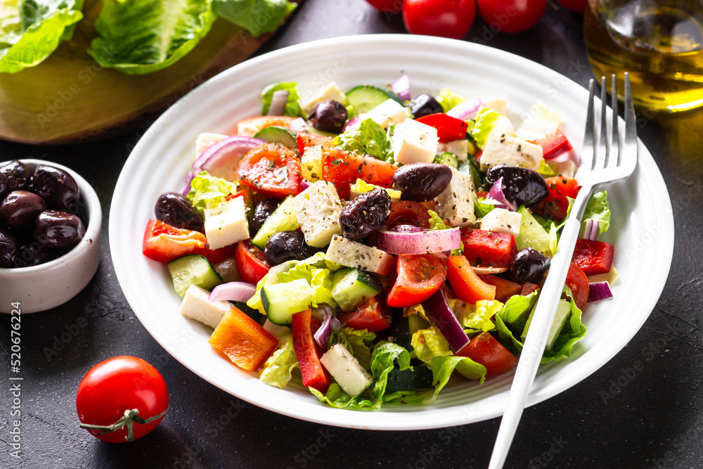 Greek salad. Vegetable salad with tomato, cucumber, feta cheese and olive oil.
