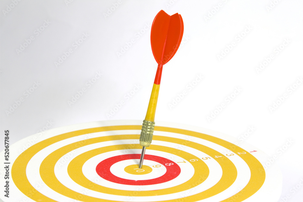 Close up yellow darts target on bullseye background, .