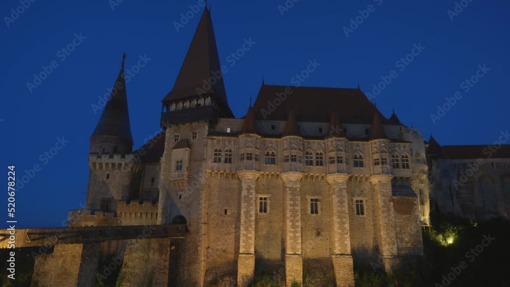 Dusk blue hour timelapse of Corvin (Hunyadi) Castle in Hunedoara, Romania Dusk blue hour timelapse of Corvin (Hunyadi) Castle in Hunedoara, Romania