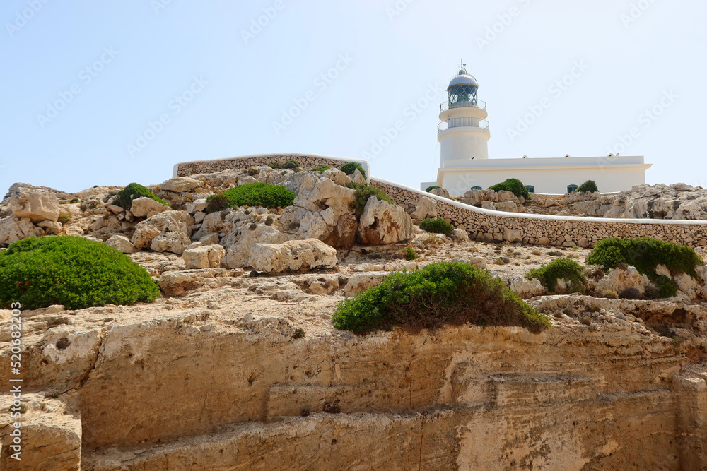 Cape de Cavalleria - the northernmost point of the Minorca island. Lighthouse on the Cap de Cavalleria. Minorca (Menorca), Spain
