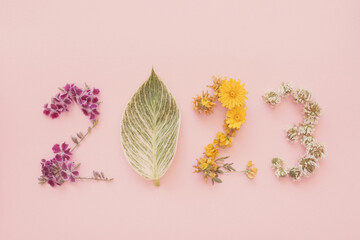 2023 made from natural plants, leaves and flowers, Happy New Year wellness and healthy lifestyle resolutions, holidays retreat concept
