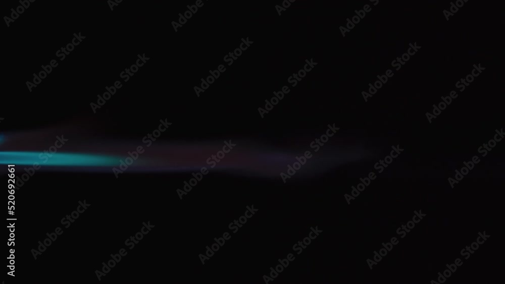 Fire flame from gas-burner close-up. Burning lighter on black background. Fire flame from gas-burner close-up. Burning lighter on black background.