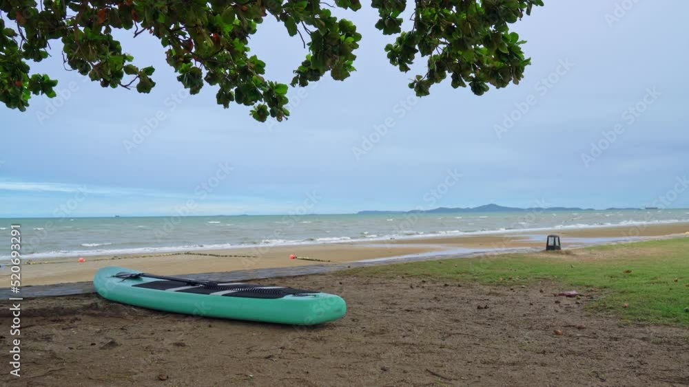 empty paddle board on beach with sea background empty paddle board on beach with sea background