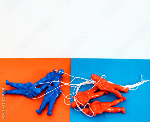 Symbol of Russia losing the war. Red and blue soldiers on Russian flag