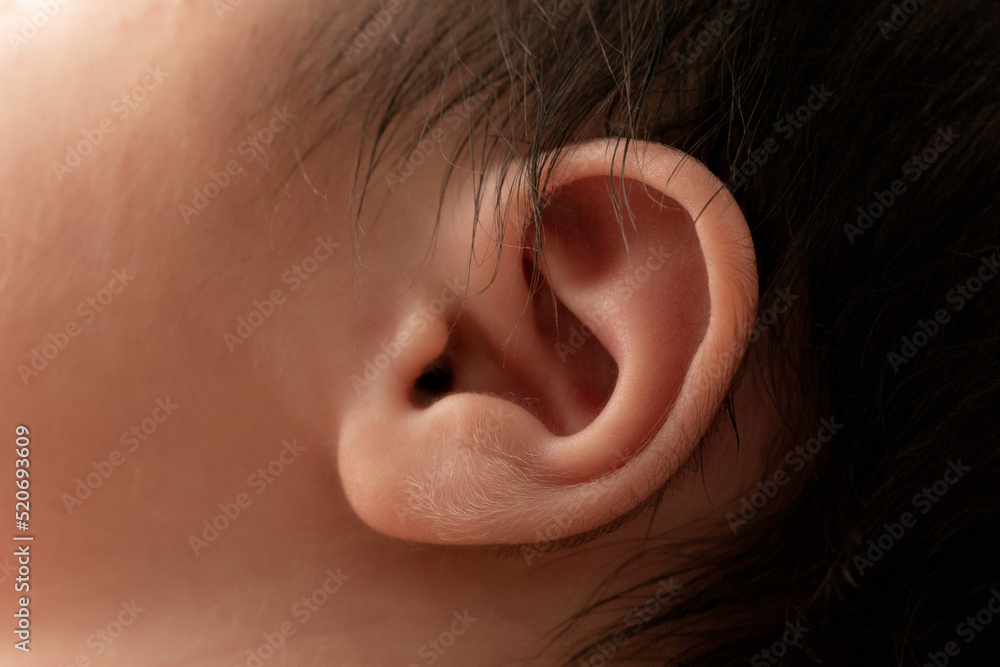 close up of newborn ear