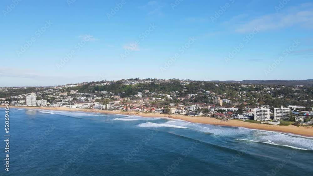 Aerial drone view of Collaroy Narrabeen Beach on the Northern Beaches of Sydney, NSW, Australia heading south on a sunny day Aerial drone view of Collaroy Narrabeen Beach on the Northern Beaches of Sydney, NSW, Australia heading south on a sunny day