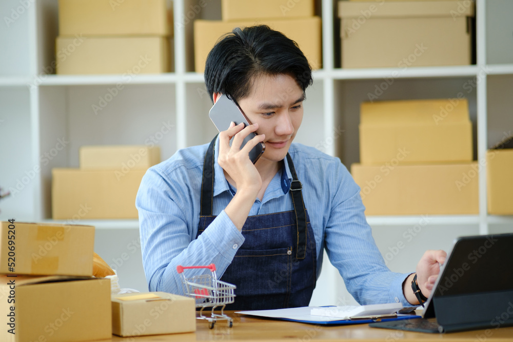 Asian business owner always keep contact with customer. Asian business owner always keep contact with customer.