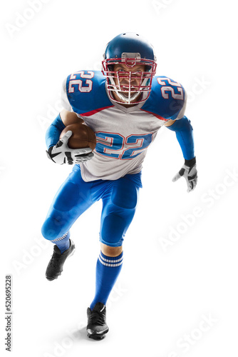 Sportsman in action. American football. Young agile american football player running fast towards goal line. Sports emotions