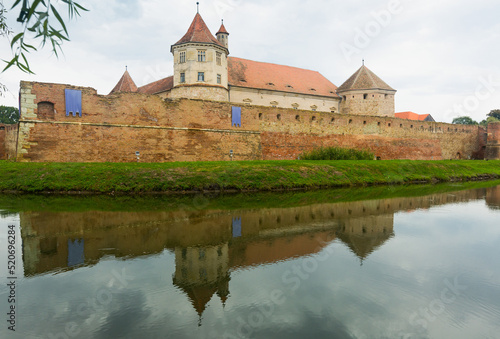 Castle on the lake is landmark of Fagaras in Romania.